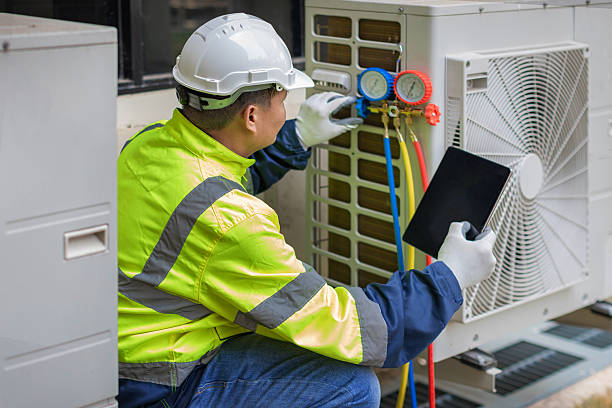 Professional Air Conditioning Repair technician working in Uniontown, OH